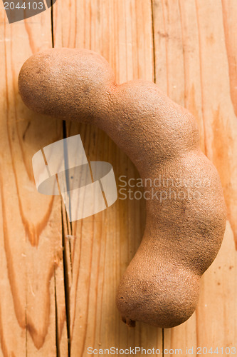 Image of tamarind on wooden table