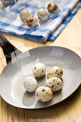 Image of quail eggs on kitchen table