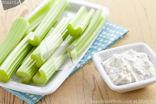 Image of green celery sticks with tasty dip