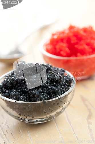 Image of red and black caviar in bowl