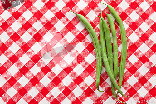 Image of bean pods on checkered background