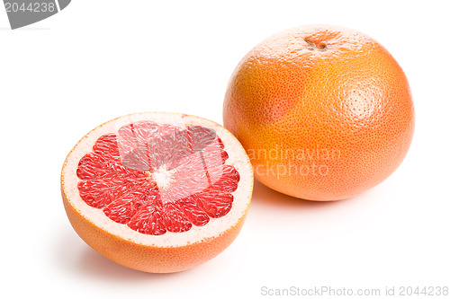 Image of sliced red grapefruit on white