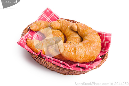 Image of fresh croissants on checkered napkin