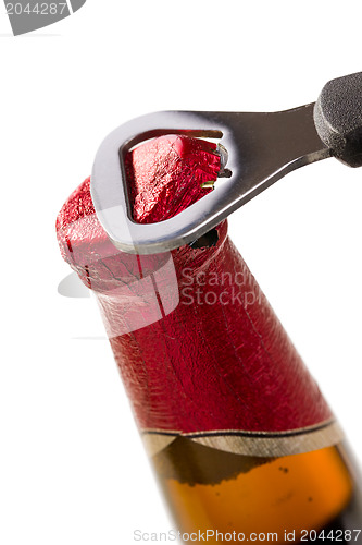 Image of opening beer cap