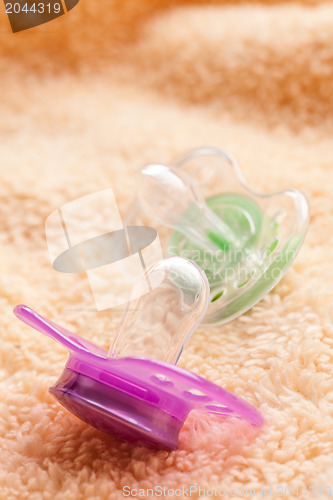 Image of the pacifier on soft background