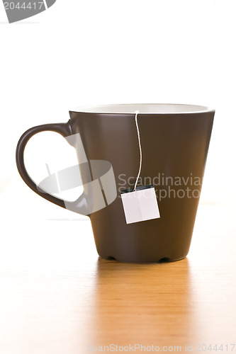 Image of cup of tea with blank label