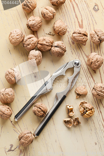 Image of nutcracker and walnuts