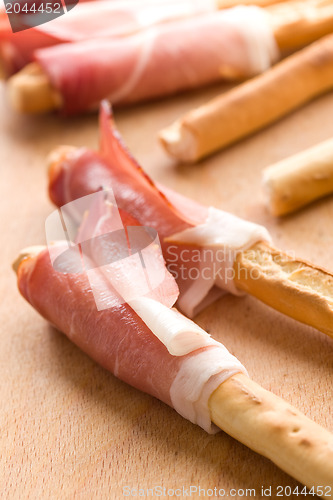 Image of grissini sticks with ham