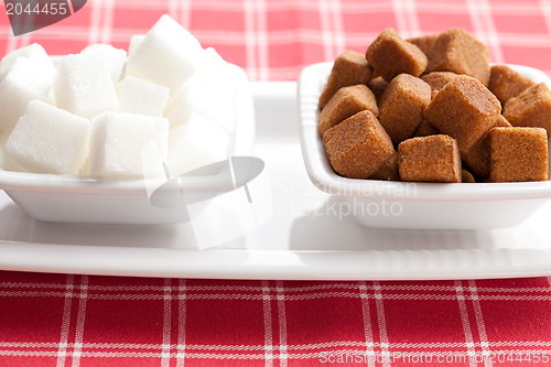 Image of brown and white cubes of sugar