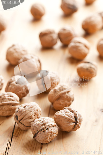 Image of walnuts on wooden table