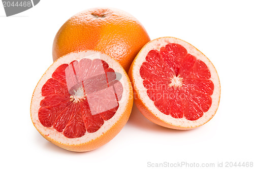 Image of sliced red grapefruit on white