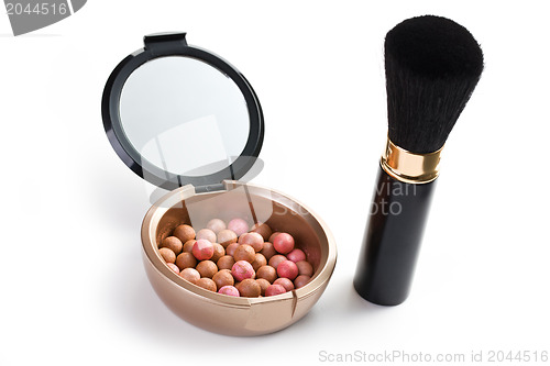 Image of bronzing pearls and makeup brush