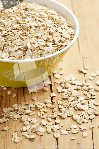 Image of oatmeal on wooden table