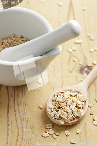 Image of oatmeal on wooden table