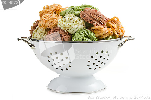 Image of pasta tagliatelle in colander