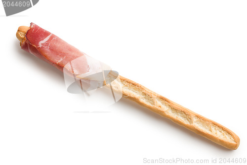 Image of grissini stick with ham