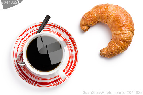 Image of fresh croissant with coffee