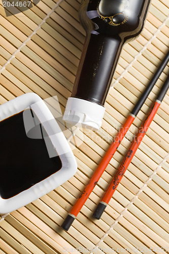 Image of soy sauce and chopsticks