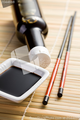 Image of soy sauce and chopsticks