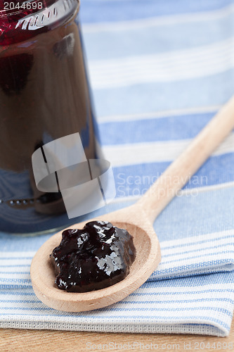 Image of fruity jam in glass jar