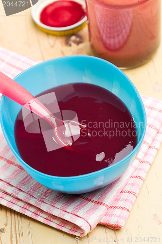 Image of baby food in plastic bowl