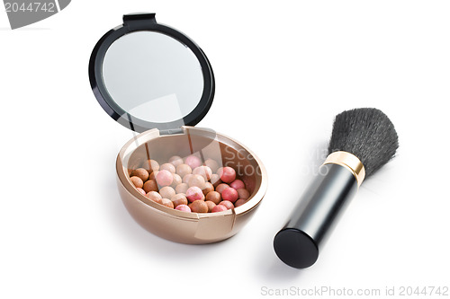 Image of bronzing pearls and makeup brush