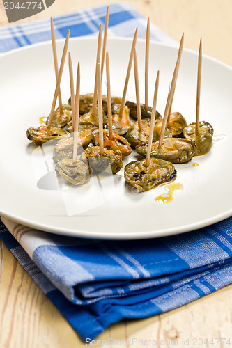 Image of tasty smoked mussels