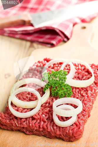 Image of raw minced meat on kitchen table