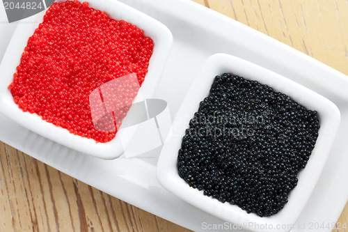 Image of red and black caviar in bowl