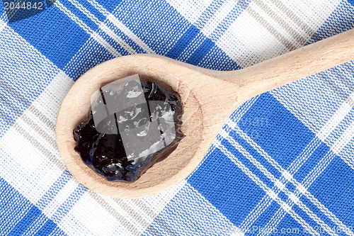 Image of fruity jam on spoon