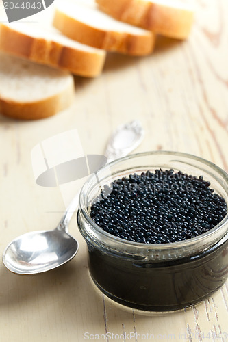 Image of black caviar in glass jar