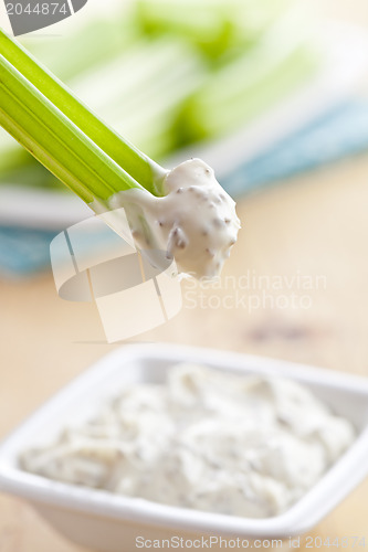 Image of green celery sticks with tasty dip