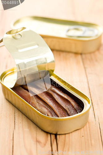 Image of anchovies fillets in tin can