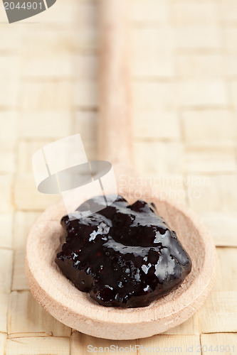 Image of fruity jam on spoon
