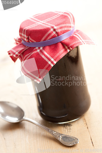 Image of fruity jam in glass jar