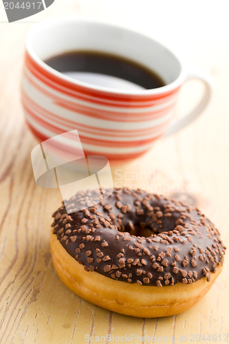 Image of doughnut with black coffee