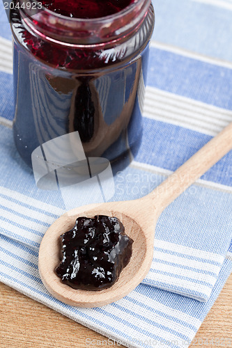 Image of fruity jam in glass jar