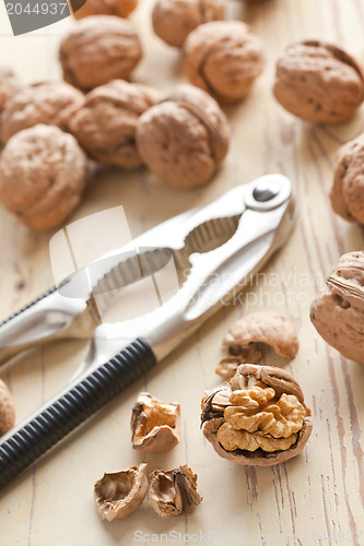 Image of nutcracker and walnuts