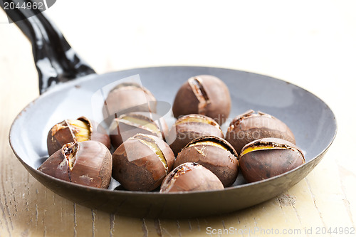 Image of roasted chestnuts on pan