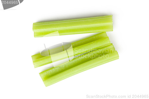 Image of green celery sticks on white background