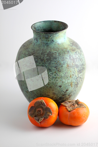Image of Persimmon with vase
