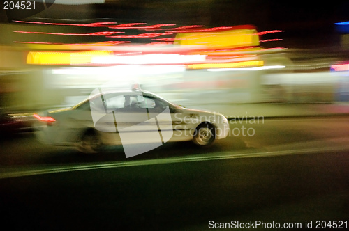 Image of taxi in motion