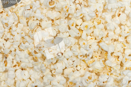 Image of Salted popcorn grains on the white background