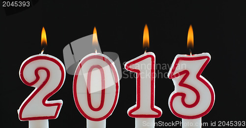 Image of Burning candles for year 2013