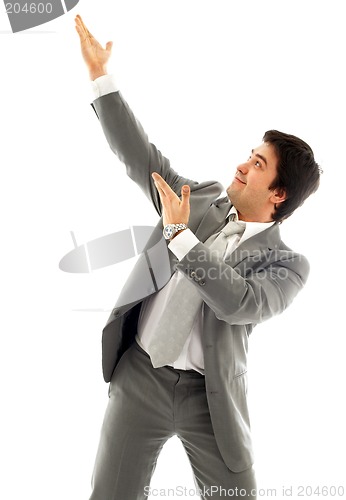 Image of businessman showing imaginary product