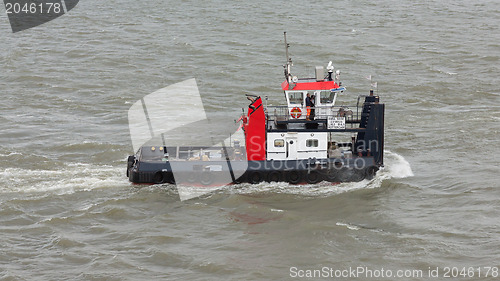 Image of Pushing boat sailing in the port of Rotterdam (Holland)