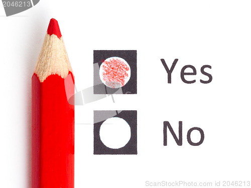 Image of Red pencil choosing between yes or no