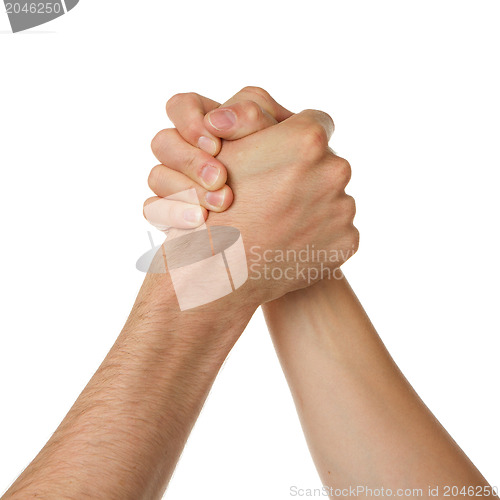 Image of Man and woman in arm wrestlin