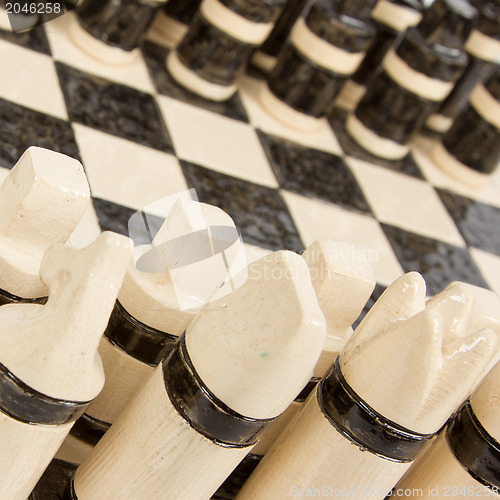 Image of Unique handmade chess set (pottery), isolated