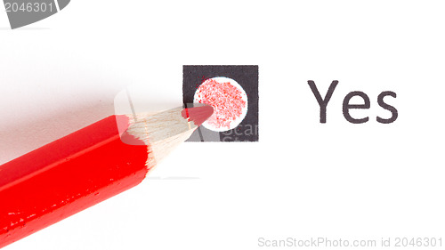 Image of Red pencil choosing between yes or no